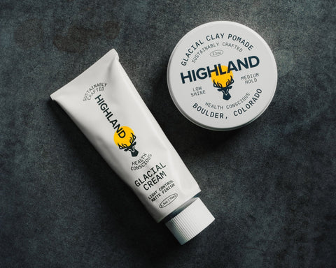 HIGHLAND glacial cream tube and glacial clay pomade tin with logo and product labels.