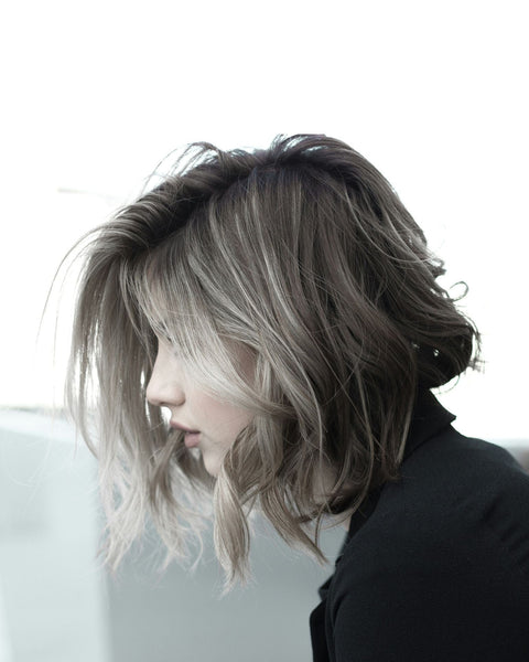 Profile of woman with layered bob haircut