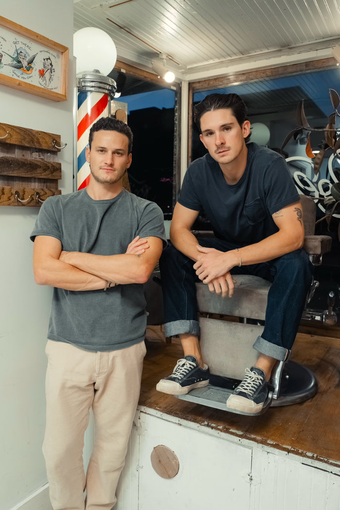 Barber styling a man's hair