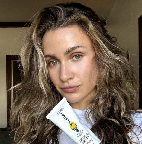 Woman holding Highland Glacial hair cream