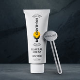 Highland Glacial Cream 2.5 oz tube with light control and matte finish, standing beside a metal Highland tube squeezer.