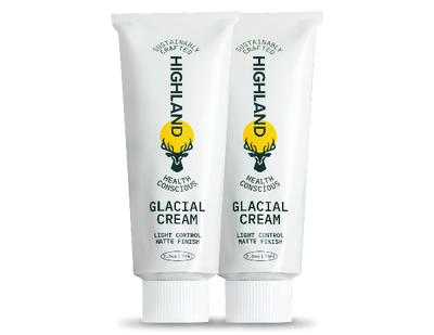Two HIGHLAND GLACIAL CREAM tubes with deer logo, SUSTAINABLY CRAFTED HEALTH CONSCIOUS LIGHT CONTROL MATTE FINISH 50ml